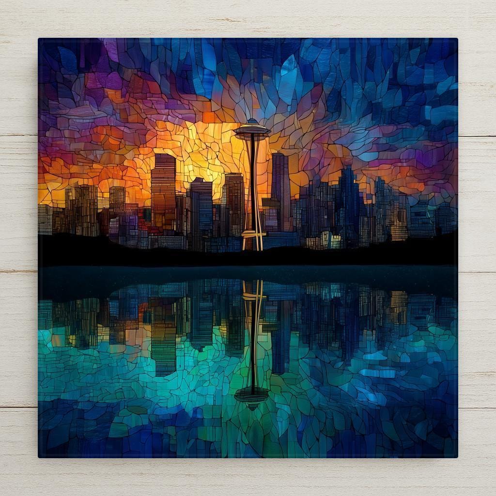 Seattle stained glass-style ceramic tile wall art features the Space Needle at sunset in glowing mosaic color. Perfect wall art and home decor gift. Includes optional tile wall hanger, easel stand, cork backing, or premium frame for wall or tabletop display. (Printed artwork — not real stained glass or mosaic.)