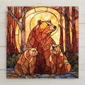 A stained glass-style ceramic tile featuring a mother bear and two cubs in warm amber tones, glowing forest light, and woodland nature scenery.
