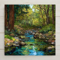 Peaceful forest creek ceramic tile wall art featuring a stained glass–style woodland stream with lush greenery and flowing water. A calming nature-inspired design for wall decor or shelf display. This is a permanent print on ceramic tile, not actual stained glass or mosaic. Optional tile wall hanger, easel tile stand, cork backing, or premium frame available.