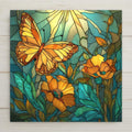 Stained glass style ceramic art tile of an orange monarch butterfly among golden poppies, leaded outlines and glowing glass-panel color on a teal background, botanical garden decor.