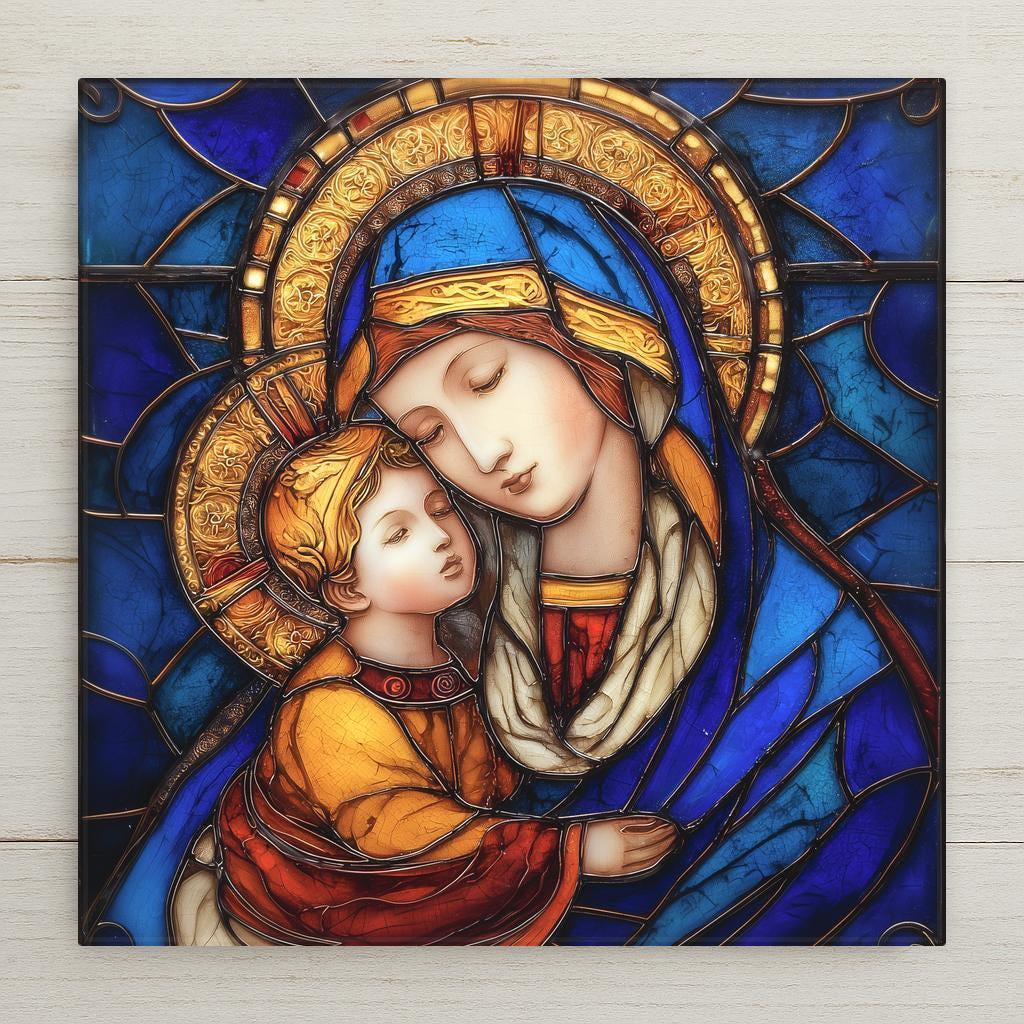Madonna and Child stained glass style ceramic tile wall art featuring Virgin Mary holding baby Jesus in rich blue and gold tones.