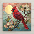 Cardinal bird ceramic tile wall art featuring a stained glass–style red cardinal with dogwood flowers and warm sunlight. Symbolic nature wall decor representing love, remembrance, and peace. Permanent print on ceramic tile, not real stained glass or mosaic. Optional wall hanger, easel stand, cork backing, or premium frame available.