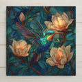 Stained glass style ceramic tile featuring a vibrant emerald and sapphire hummingbird hovering among glowing ivory magnolia flowers. Deep teal background with golden leading creates dramatic botanical wall art perfect for bird lovers and nature home decor.