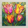 Stained glass style tulip ceramic tile wall art featuring vibrant pink, yellow, orange, and coral tulips with green leaves in a luminous botanical floral design.