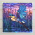 stained glass blue heron flying over water with cattails sunset tile art