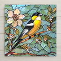 Stained glass-inspired ceramic tile art featuring a vibrant goldfinch with flowers. Perfect goldfinch bird wall art for spring wall decor, bird lovers, and unique gifts.