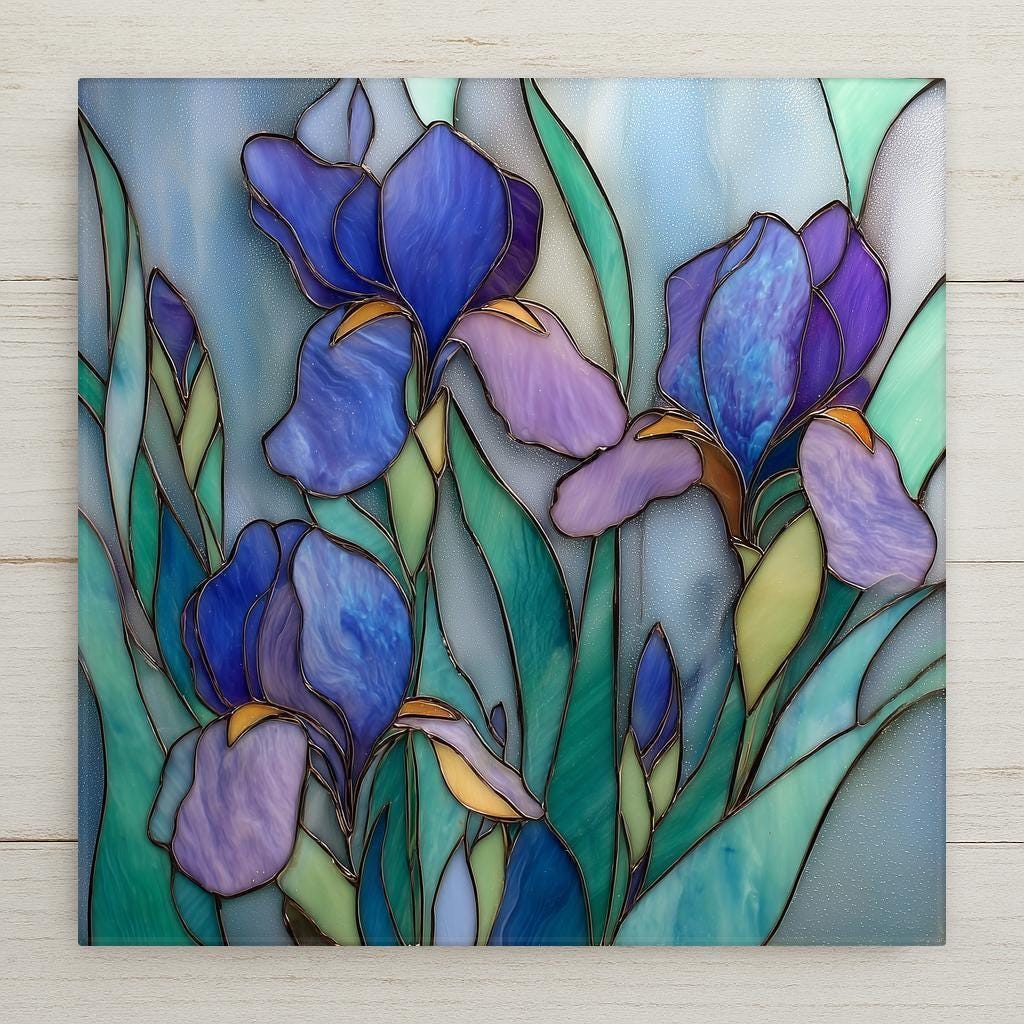 Stained glass style ceramic art tile of purple and blue bearded irises with gold accents on a teal and sage glass background — a February birth flower and purple floral wall decor.