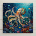 Colorful painterly ceramic art tile of an orange octopus among coral, fish, and sea plants on a deep blue ocean background — a marine sea life and coastal wall decor.