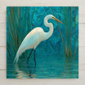 White Egret in Reeds ceramic tile wall art with soft teal and cream tones. Perfect for coastal wall decor or beach home decor. Optional frame, wall hanger, easel, or cork backing available.