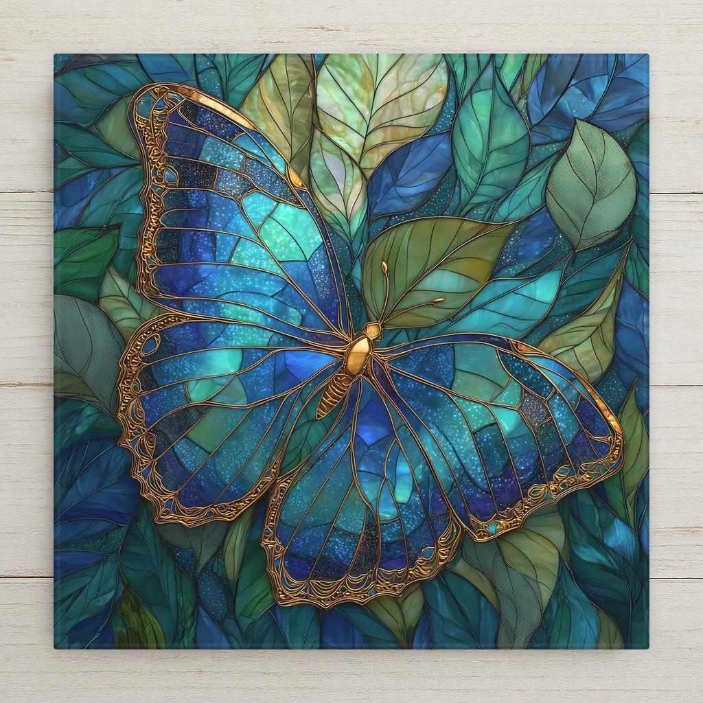 stained glass style blue butterfly with gold filigree wings on teal leaves