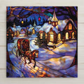 Stained glass style ceramic tile featuring a snowy village, glowing lanterns, and a horse-drawn sleigh. A perfect Christmas wall art piece or holiday gift, crafted with lasting, vibrant colors. Optional tile wall hanger, easel tile stand, or cork backing available.