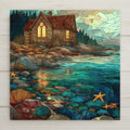 Stained glass style ceramic tile of a glowing coastal cottage beside teal tide pools with rocks, shells, and starfish.
