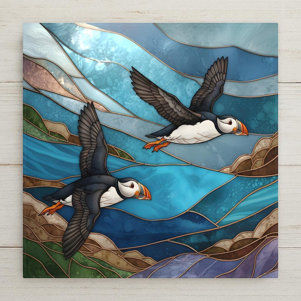 Two Atlantic puffins flying over layered turquoise ocean waves in stained glass style, coastal ceramic tile wall art.