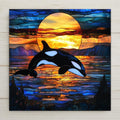 May include: A stained glass image of an orca jumping out of the water with a sunset behind it. The orca is black and white and the sunset is a mix of orange, yellow, and red. The water is blue and the sky is a dark blue with clouds.