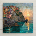 Ceramic tile wall art featuring Manarola in Cinque Terre, Italy, with colorful cliffside homes at sunset overlooking turquoise coastal waters in a mosaic-style design.