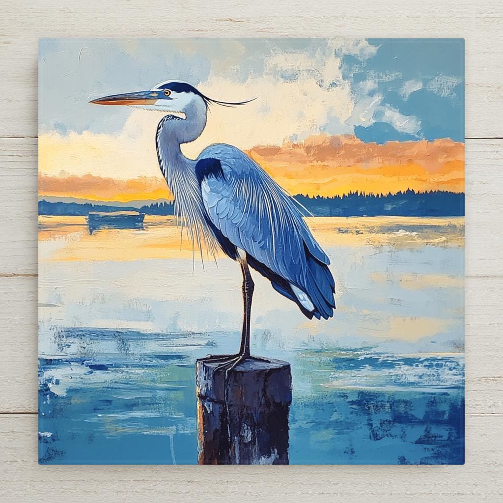 Stained glass style great blue heron ceramic tile in cobalt teal and gold, standing in still water at dawn, a vivid bird lover gift or coastal bathroom decor.