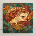 Stained glass style hedgehog ceramic tile nestled in autumn leaves and mushrooms, deep teal and gold palette, a vivid woodland animal lover gift.