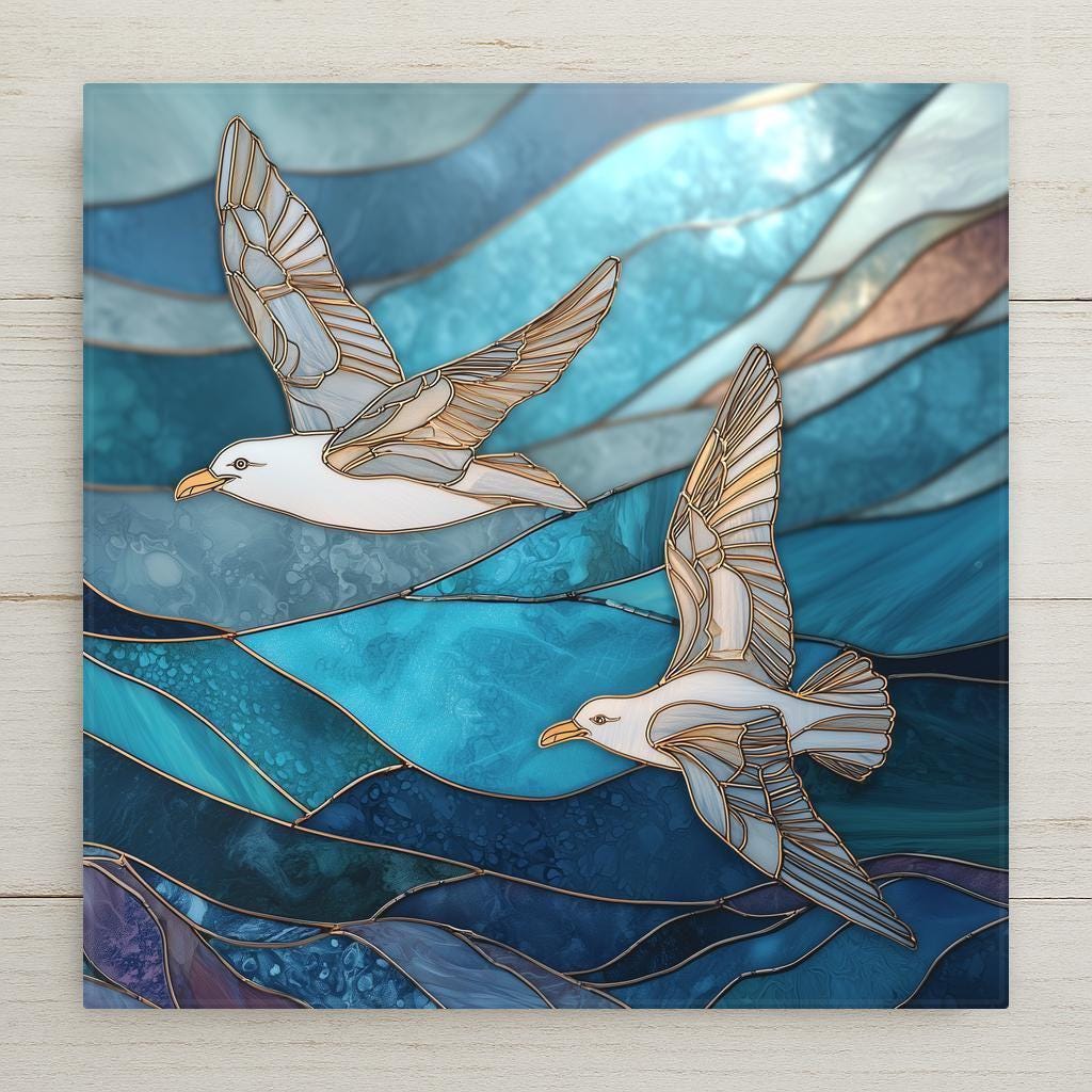 Two stained-glass style seagulls soar over layered blue ocean waves in a coastal decorative tile design.