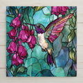 Stunning stained-glass-style ceramic tile featuring a hummingbird with vivid pink fuchsia blooms. Makes a perfect spring wall art gift. Optional tile stand, tile wall hanger, or cork backing available to customize your display.