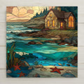 Stained glass style ceramic tile featuring a stone coastal cottage, glowing windows, ocean waves, tide pools, starfish, and seashells.