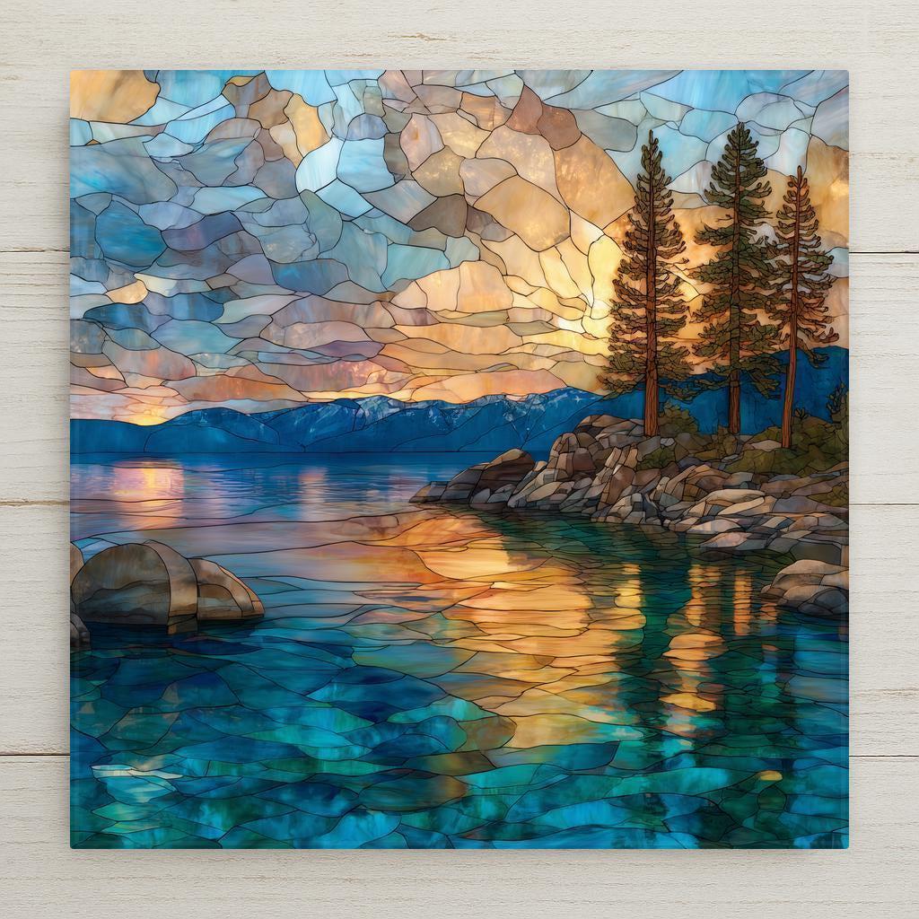 Stained glass–style Lake Tahoe ceramic tile wall art featuring mountain peaks, pine trees, and glowing sunset reflections on blue lake water. Nature home decor inspired by alpine scenery. Permanent print on ceramic tile, not real glass or mosaic. Optional tile wall hanger, easel tile stand, cork backing, and premium frame available.