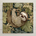 Whimsical sloth ceramic tile wall art with moss green leaves and earth brown tones. Permanent ceramic print wall decor. Optional hanger, stand, or cork backing.
