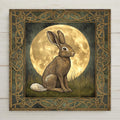 This handmade ceramic tile features a Celtic hare under a glowing full moon, framed by knotwork. Earth-toned and nature-inspired, it’s perfect for rustic homes or as a gift. Optional tile stand, tile wall hanger, and cork backing available.