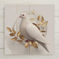 A peaceful modern white dove ceramic tile featuring soft gold botanical accents. Perfect for spiritual spaces, minimalist decor, and meaningful gifts. Permanently printed artwork (not gold foil). Optional tile wall hanger, easel tile stand, cork backing, or premium frame available.