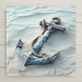 Nautical anchor ceramic tile wall art featuring a weathered blue anchor resting in soft beach sand, wrapped with rope in muted coastal tones. Ocean-inspired home decor printed as a permanent, high-resolution ceramic tile with optional wall or tabletop display.