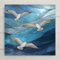 Stained glass style seagull ceramic tile featuring three flying seagulls over flowing blue ocean waves in coastal stained glass design inspired by seaside decor.