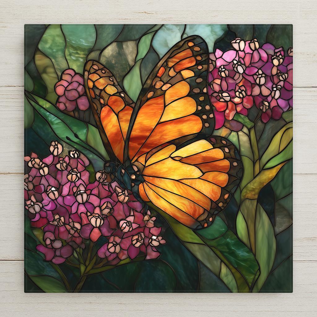 Orange monarch butterfly resting on pink flowers with green foliage in stained glass style, ceramic tile wall art.