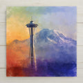 Space Needle wall art ceramic tile with Mount Rainier in stained glass style. Glossy finish, jewel-tone colors, and premium sublimation ensure lasting brilliance. Optional satin frame with stand, cork backing, or easel available. Perfect Seattle gift or home décor accent.