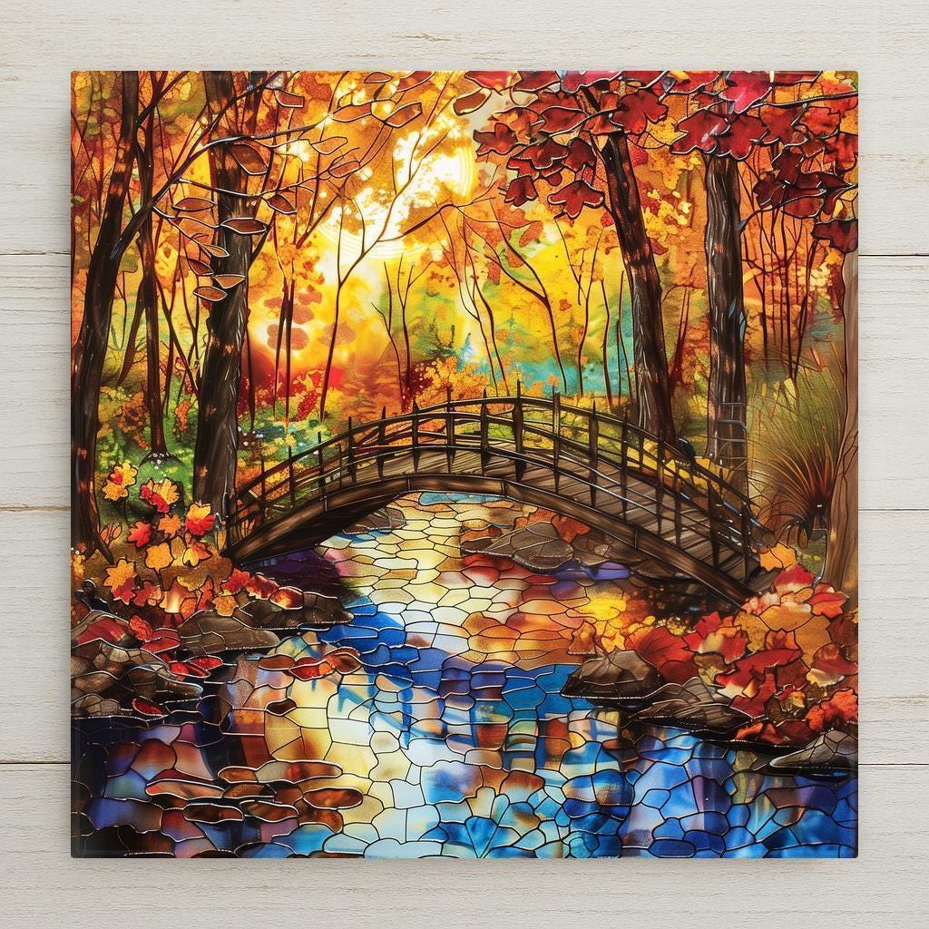 Stained glass–style ceramic tile wall art featuring a rustic autumn bridge and colorful forest reflection. While it may look like stained glass or mosaic, this is a permanent print on tile. Printed with premium inks for bold, lasting color. Optional add-ons include a tile wall hanger, easel tile stand, or cork backing. Perfect for rustic fall décor, seasonal wall art, or thoughtful Thanksgiving gifts.
