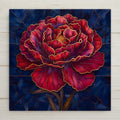 Stained glass style ceramic art tile of a large deep-red peony with gold-edged petals and a golden center, on a marbled navy blue background — a moody, dark academia floral wall decor.