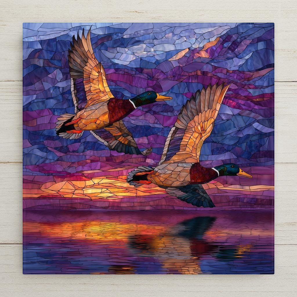 Two mallard ducks fly together over glowing water in this stained glass-style ceramic tile artwork. Symbolizing partnership, bonding, and shared journeys, this high-resolution ceramic print offers the look of stained glass while remaining durable and fade-resistant. A meaningful couples or anniversary gift, perfect for home decor. Optional cork backing, easel stand, tile wall hanger, and premium black frame are available.