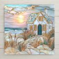 This stained glass-style ceramic tile features a coastal cottage and beach sunset in soft pastel hues. A perfect beach house accent or gift.