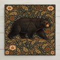 Brown bear walking through ornate forest foliage in William Morris style woodland ceramic tile artwork with rich earth tones.
