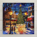 Home decor stained glass–style ceramic tile featuring a glowing Christmas town square with a radiant tree, snowy streets, and warmly lit shops. While it may look like stained glass or mosaic, this is a permanent print on tile. Printed with premium inks for lasting vivid color. Optional add-ons include a tile wall hanger, easel tile stand, or cork backing. Perfect for holiday décor, nostalgic winter wall art, or festive Christmas gifts.