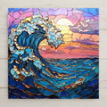 Bold ocean wave ceramic tile in stained glass style with glowing sunset. Vivid blues and golds create stunning coastal wall art. Perfect handmade beach gift.