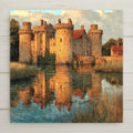 Stained glass–style ceramic tile wall art featuring Leeds Castle in Kent, England. This historic English castle artwork captures warm stone towers reflected in calm water. Printed on ceramic tile for vivid, lasting color. Decorative wall art inspired by stained glass—this is a permanent print, not real glass. Optional wall hanger, easel stand, cork backing, and premium frame available.