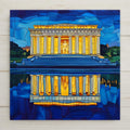 Stained glass style Lincoln Memorial ceramic tile glowing gold at dusk with the seated Lincoln statue illuminated between white columns, mirrored in the deep cobalt blue Reflecting Pool below.