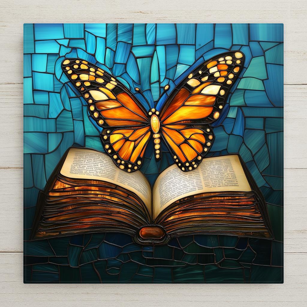 Stained glass style open book ceramic tile with a warm amber gold butterfly emerging from the pages lifting into flight against deep cobalt teal, a vivid book lover memorial gift.