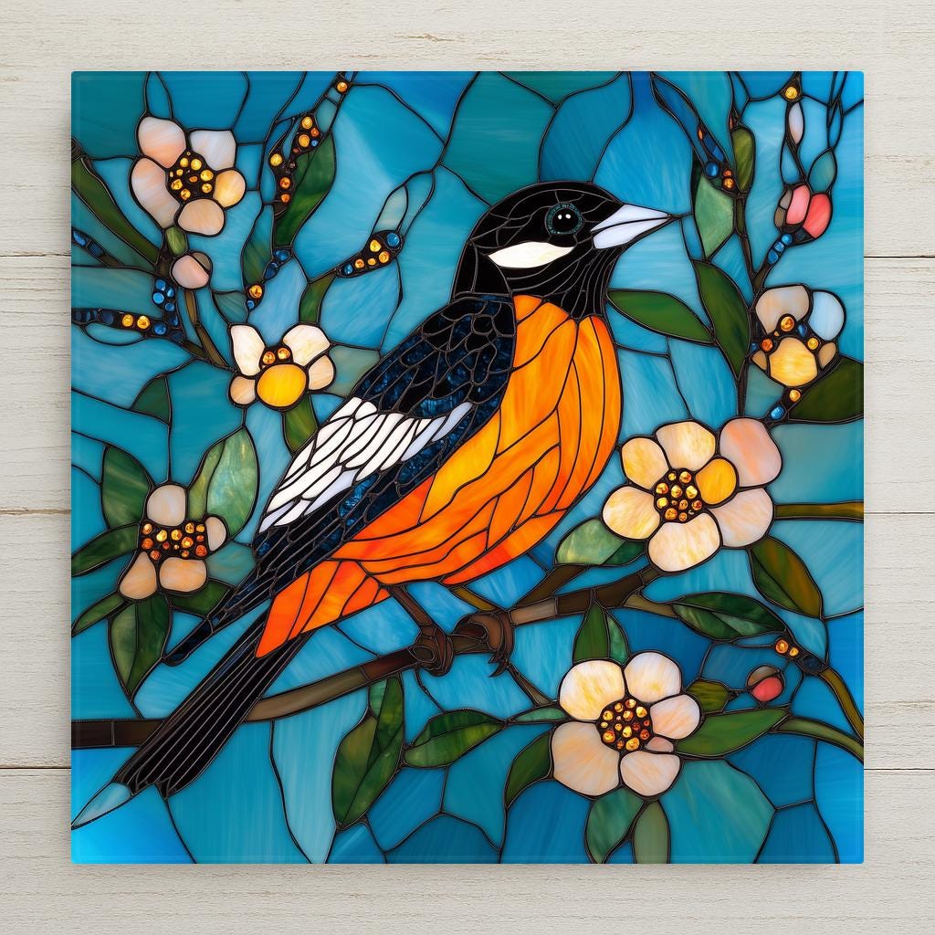 Stained glass style Baltimore oriole ceramic tile with a vivid flame orange and black bird perched on a blossoming spring branch against a deep cobalt and teal sky, warm gold light on the plumage, a vivid bird lover and orange bird decor gift.