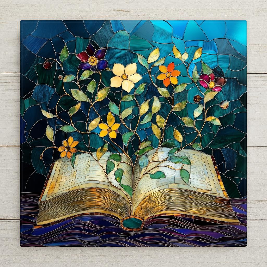 Stained glass style open book ceramic tile with warm gold botanical vines and flowers growing from the pages against deep cobalt teal, a vivid book lover reader gift.