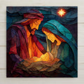 The Holy Family — Mary, Joseph, and the infant Jesus — gathered in the manger beneath a guiding star, rendered in warm stained-glass-style jewel tones on a ceramic tile.