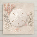 Sand dollar ceramic art tile with fine star detail on soft sand in cream, blush and soft grey.