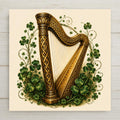 Irish gold harp with Celtic knotwork and shamrocks ceramic art tile in emerald, brushed gold and stout brown on cream.