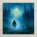 Moody painterly ceramic tile of a sasquatch silhouette in a misty forest clearing gazing up at a glowing UFO hovering above the evergreens with a pale beam of light
