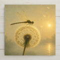 Painterly ceramic art tile of a golden dragonfly with translucent wings perched on a luminous dandelion seed head, seeds drifting toward a hazy sunrise over a misty lake