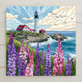 Maine coast lupine ceramic tile art in stained glass style with a white lighthouse on a rocky point, ocean waves, gulls and purple and pink lupine flowers in the foreground